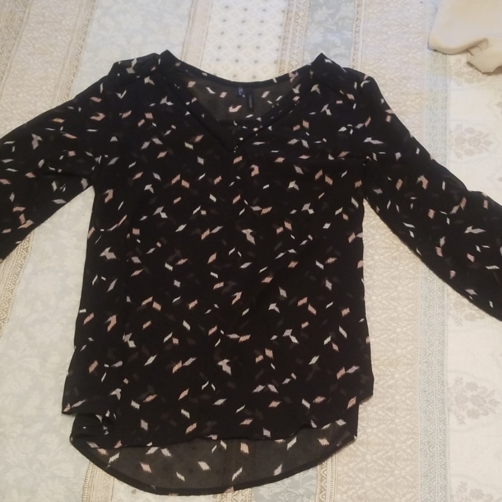Sheer long sleeve blouse.